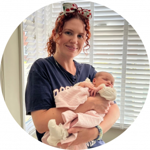Doula Jess holding a new born baby
